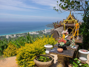 Buddhist altar with view on karon beach