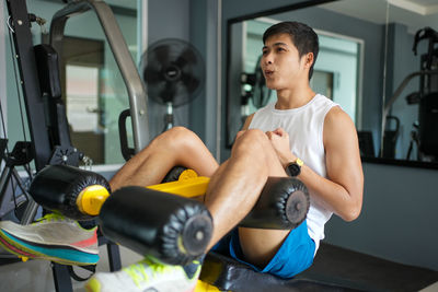 Man exercising in gym