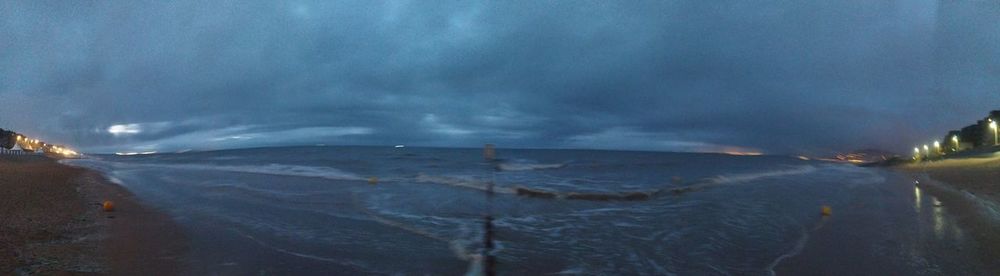 Panoramic view of landscape against sky at night
