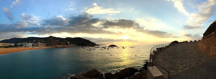 Scenic view of sea against sky at sunset