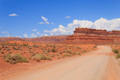 Dirt road passing through a desert