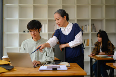 Business colleagues working at office