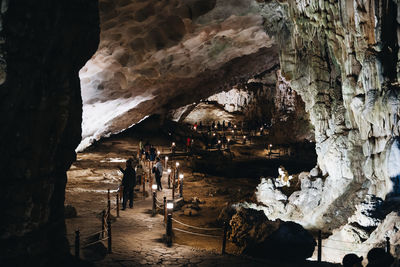 People walking in cave