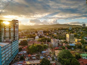 High angle view of townscape against sky at sunset