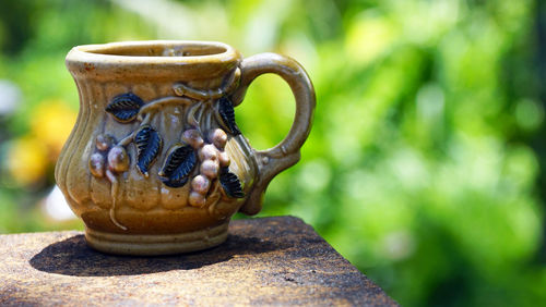 Close-up of cup outdoors