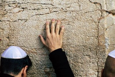 High angle view of people with hands