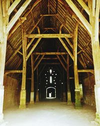Low angle view of empty corridor in building
