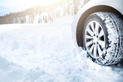 Close-up of tire tracks in snow