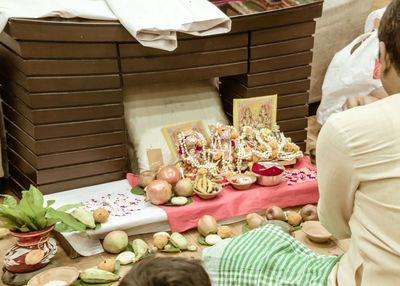 High angle view of people on table at home