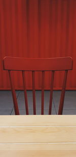 Close-up of empty chair on table