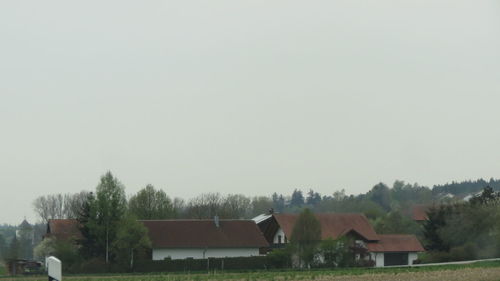 Houses against clear sky