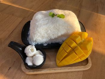 High angle view of ice cream in plate on table