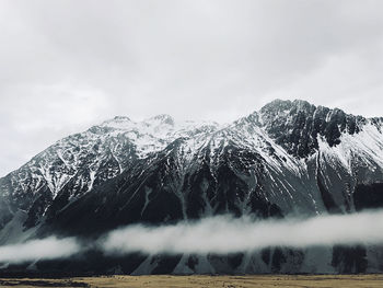 Snow covered mountain against sky