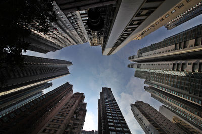 Low angle view of skyscrapers against sky