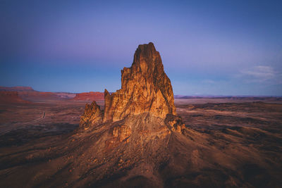 Aerial view of agathla peak in the morning from above, arizona
