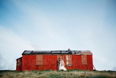 Built structure on field against clear sky