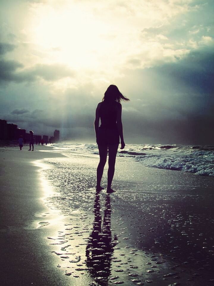 sea, beach, water, sky, horizon over water, shore, full length, walking, rear view, lifestyles, leisure activity, silhouette, standing, sand, cloud - sky, men, tranquility, person