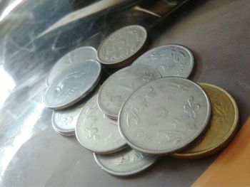 High angle view of coins