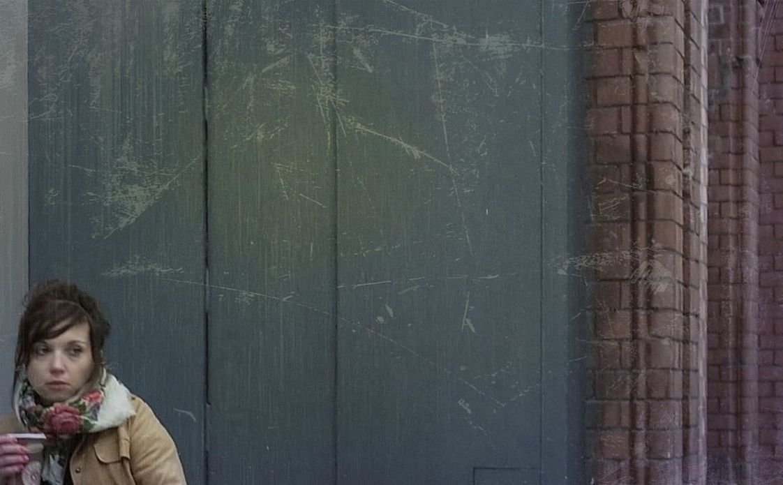 lifestyles, person, leisure activity, front view, wall - building feature, casual clothing, childhood, young adult, indoors, standing, looking at camera, portrait, smiling, built structure, headshot, architecture, young women, elementary age