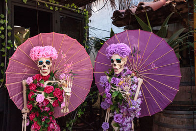 Close-up of decorated human skull outdoors