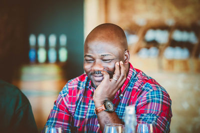 Side view of young man that just received a great news