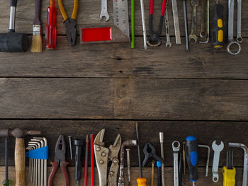 Directly above shot of work tools on wooden table