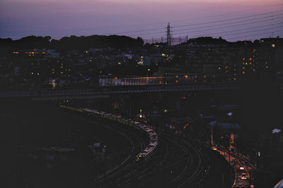 High angle view of illuminated city at night