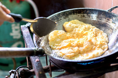 Close-up of person preparing food