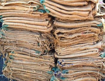 Stacked folded sacks on table