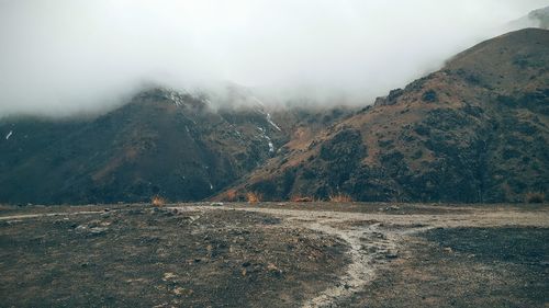 Scenic view of mountains against sky