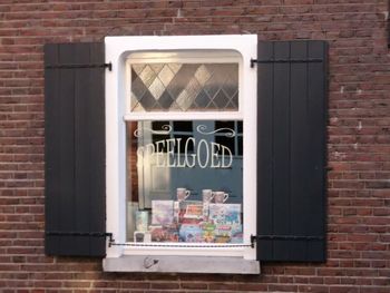 Reflection of window on brick wall