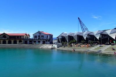 Buildings next to sea