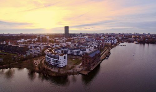 Aerial view of city at sunset