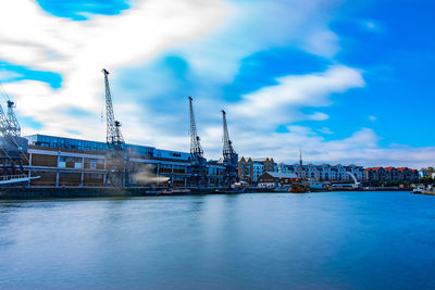 View of buildings against cloudy sky