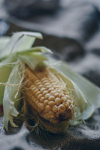 Close-up of corn on table