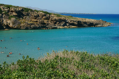 Scenic view of sea against clear blue sky