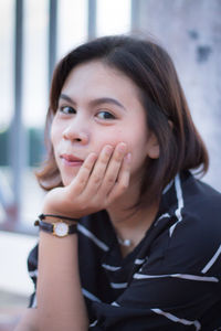 Portrait of a smiling young woman