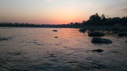 Scenic view of sea against sky during sunset