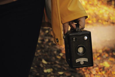 Close-up of hand holding camera