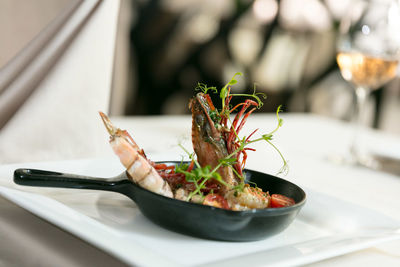 Close-up of food in plate on table