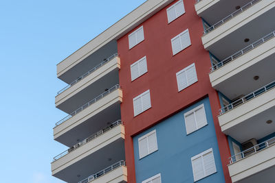 Modern ventilated facade with balconies. 