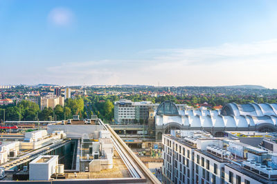 High angle view of buildings in city against sky