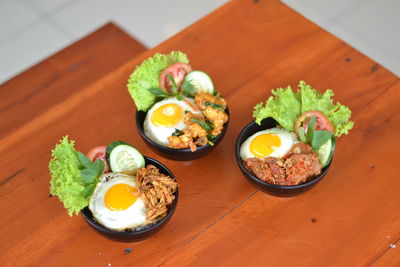 High angle view of breakfast served on table