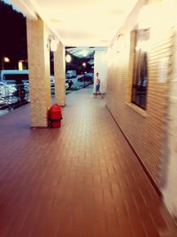 Walkway in illuminated building