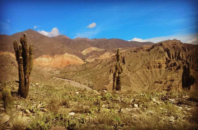 mountain, landscape, tranquil scene, tranquility, mountain range, scenics, beauty in nature, nature, sky, non-urban scene, physical geography, geology, rock formation, remote, arid climate, blue, rocky mountains, sunlight, rock - object, desert