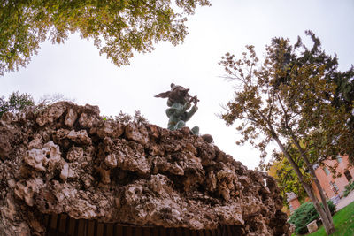 Low angle view of statue against clear sky