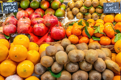 Piles of different colorful fruits seen at a market in barcelona, spain
