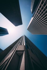 Low angle view of modern buildings against sky