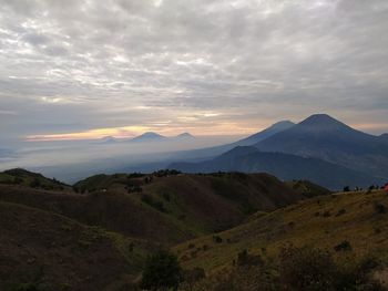 Scenic view of mountains against sky during sunset