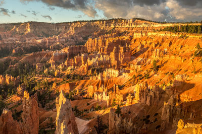 Sunrise light hits the amphitheater at the bryce canyon